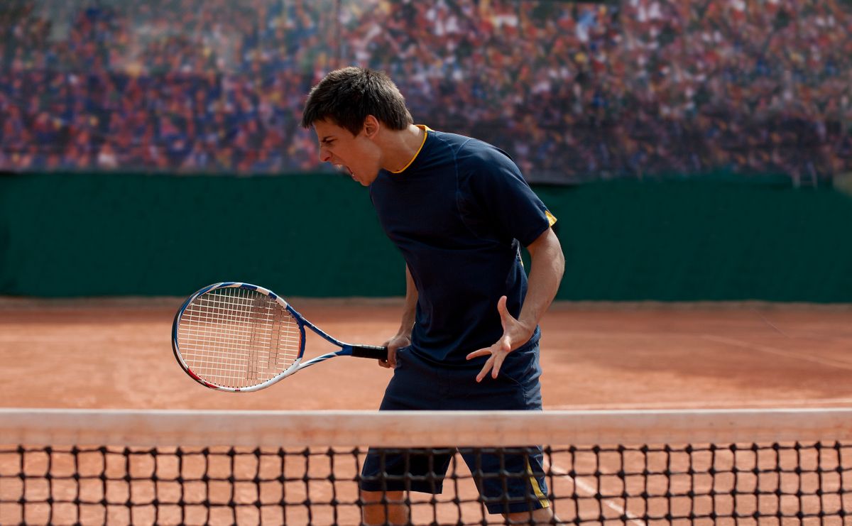 Tennis player on clay court